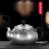 Shell Embossed Kung Fu Silver Teapot
